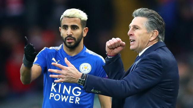 Claude Puel, Manager of Leicester City gives Riyad Mahrez of Leicester City instructions