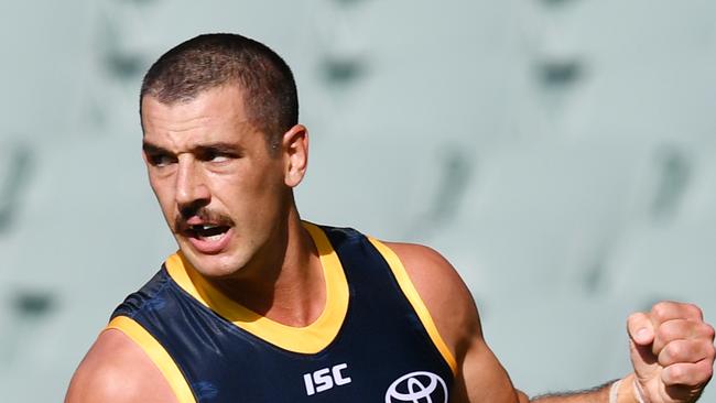 Taylor Walker of the Crows reacts after scoring a goal during the Round 1 AFL match between Adelaide Crows and Sydney Swans at Adelaide Oval in Adelaide, Saturday, March 21, 2020. (AAP Image/David Marauz) NO ARCHIVING, EDITORIAL USE ONLY