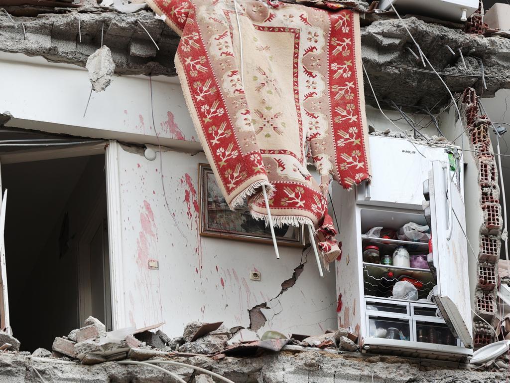 Blood stained walls on an Adana home that has been destroyed by the earthquake. Picture: Getty