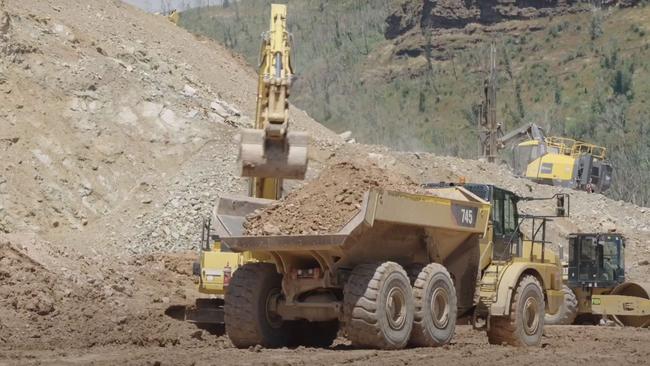 Heavy earthmoving equipment working at the site of Snowy Hydro 2.0.