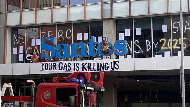 Slogans graffitied on the Santos building. Picture: Patrick James