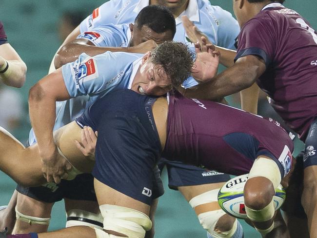 Lukhan Salakaia-Loto of the Reds is tackled during the Round 4 Super Rugby match between the NSW Waratahs and the Queensland Reds at the SCG in Sydney, Saturday, March 9, 2019. (AAP Image/Craig Golding) NO ARCHIVING, EDITORIAL USE ONLY