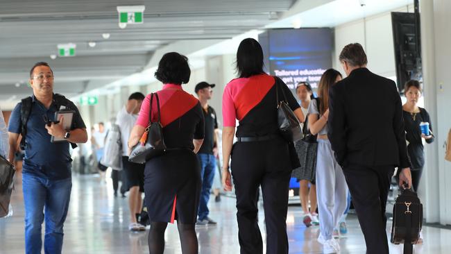 Qantas staff at the Brisbane domestic terminal. Picture: Adam Head