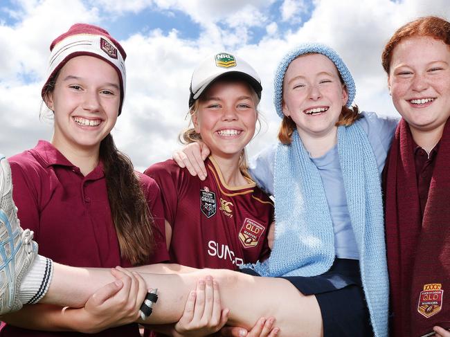 St Anthony's Primary School students Matilda Lang, 11, Matilda Hill, 11, Matilda Kelly, 11, and Tara Williams, 11, wearing maroon and blue colours for the Women's State of Origin. Pics Tara Croser.