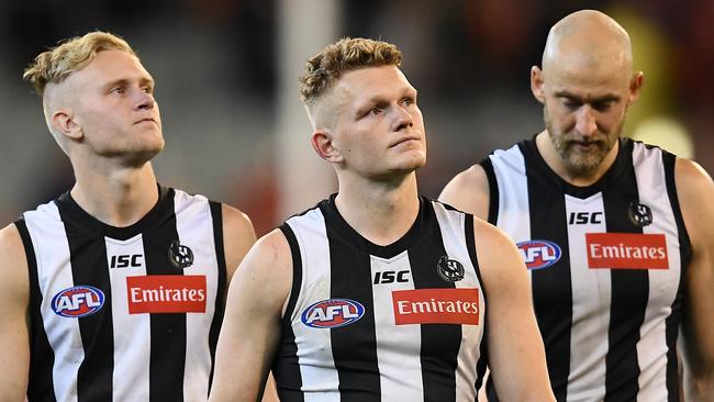 Jaidyn Stephenson, Adam Treloar and Ben Reid are all no longer at Collingwood. Picture: Getty Images