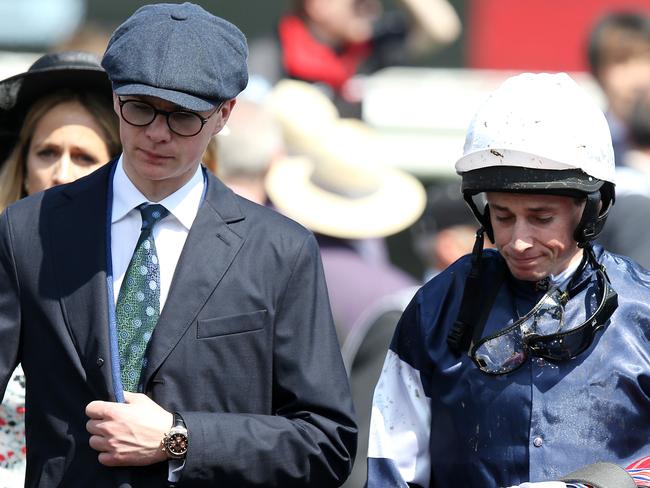 Melbourne Cup Day races at Flemington Racecourse. 06/11/2018. Race 7. The Melbourne Cup.  Jockey Ryan Moore talks with connections of The cliffsofmoher after it broke down early in the race    . Pic: Michael Klein