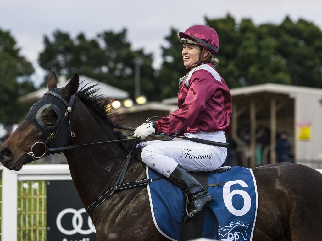 Jockey Alannah Fancourt returns to the winners stall on Chevrons'n'rockers after race one at Clifford Park Racecourse, Saturday, June 19, 2021. Picture: Kevin Farmer
