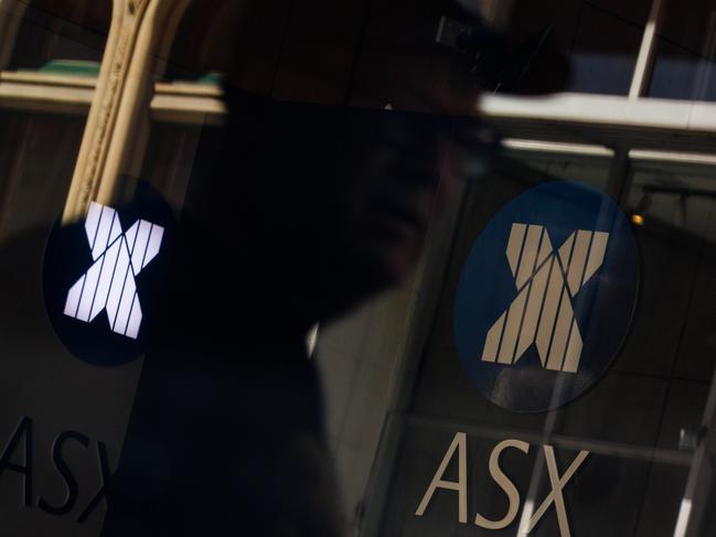 SYDNEY, AUSTRALIA - NewsWire Photos, October 29 2024. GENERIC. Stocks. Finance. Economy. People walk past the Australian Stock Exchange, ASX, on Bridge Street. Picture: NewsWire / Max Mason-Hubers