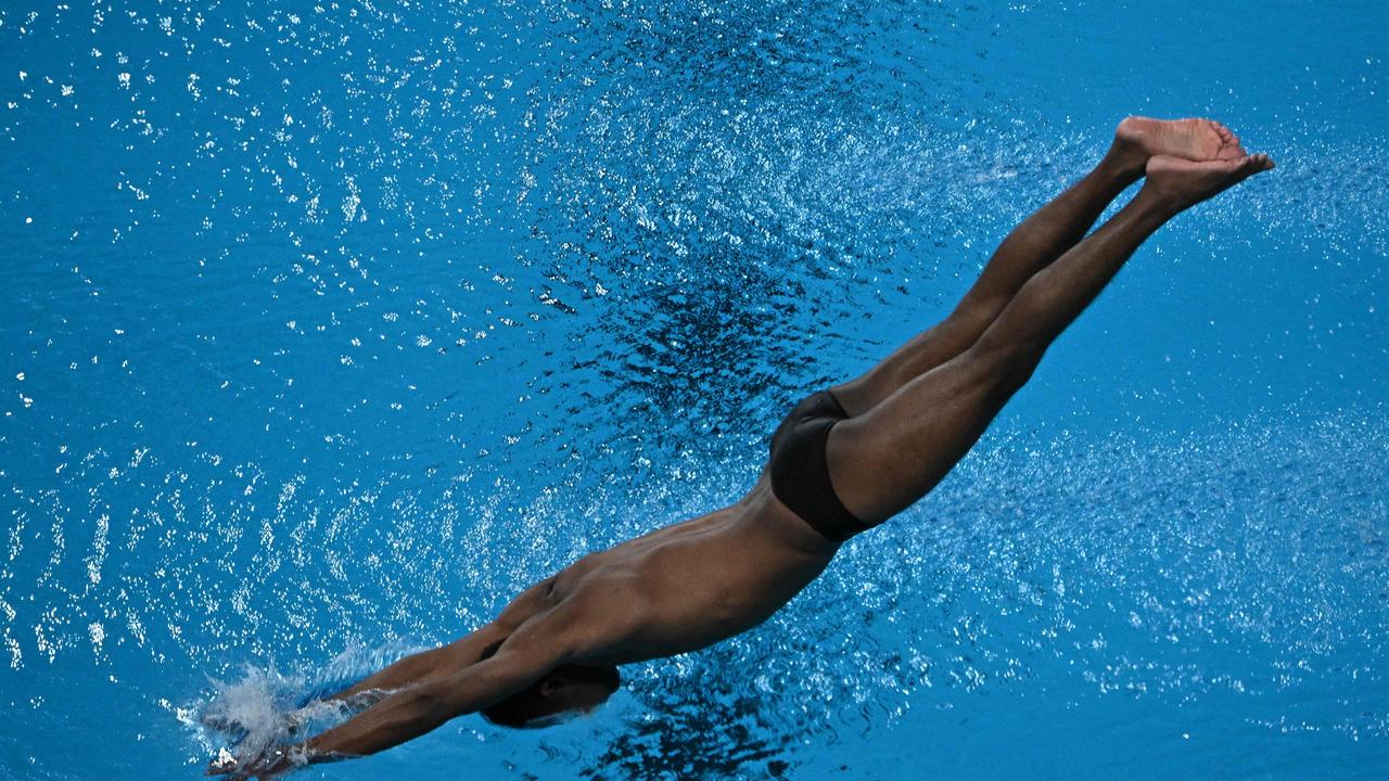 Sri Lanka's Fernando Dulanjan Kaushalya belly flops into the water.