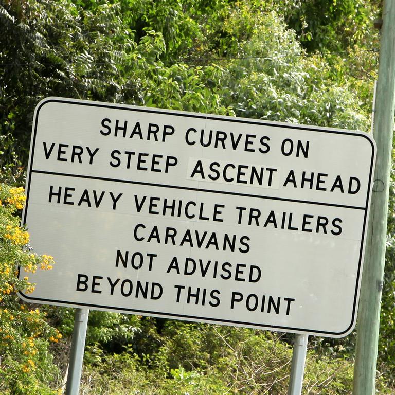 Road signs on Mt Glorious Road.