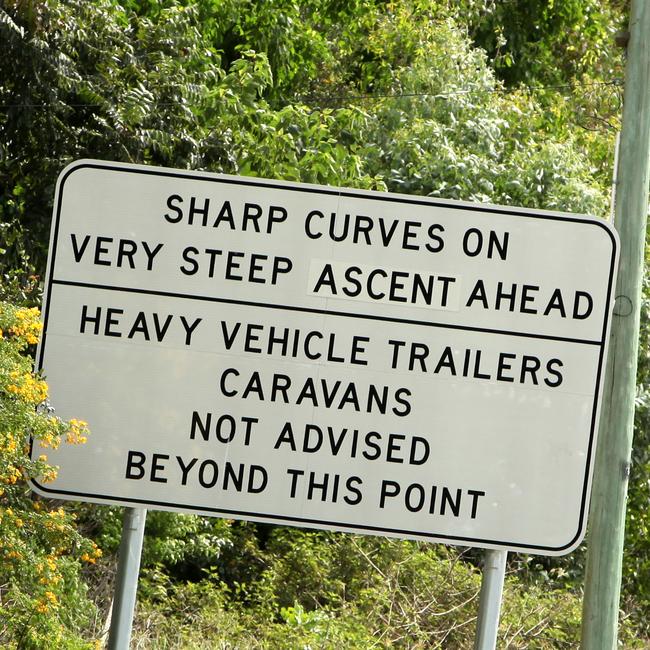 Road signs on Mt Glorious Road.