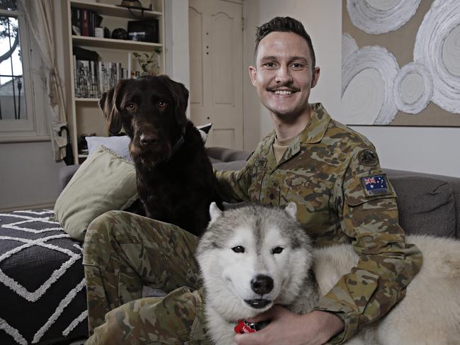 Captain Hugo Toovey with his dogs  Ernie (brown labradoodle) and Iggy (Husky) at his home in Bondi on the 21st May 2020. Photographer: Adam Yip