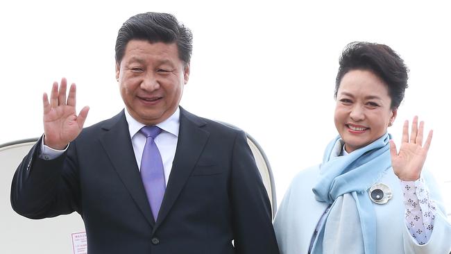 Arrival of Chinese President Xi Jinping with Madame Peng at Hobart International Airport. The President and Madame Peng wave on arrival.