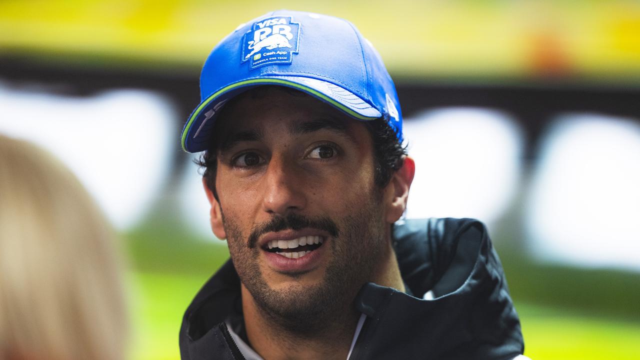 SPA, BELGIUM - JULY 27: 13th placed qualifier Daniel Ricciardo of Australia and Visa Cash App RB talks to the media during qualifying ahead of the F1 Grand Prix of Belgium at Circuit de Spa-Francorchamps on July 27, 2024 in Spa, Belgium. (Photo by Rudy Carezzevoli/Getty Images)