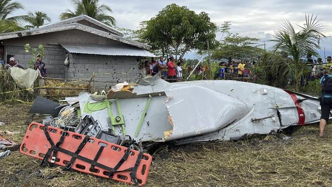 Wreckage of airplane in a rice field in Maguindanao del Sur province, Philippines, after officials say a U.S. military-contracted plane has crashed in a rice field in the southern Philippines, killing all four people on board, on Thursday Feb. 6, 2025. (Sam Mala/UGC via AP)