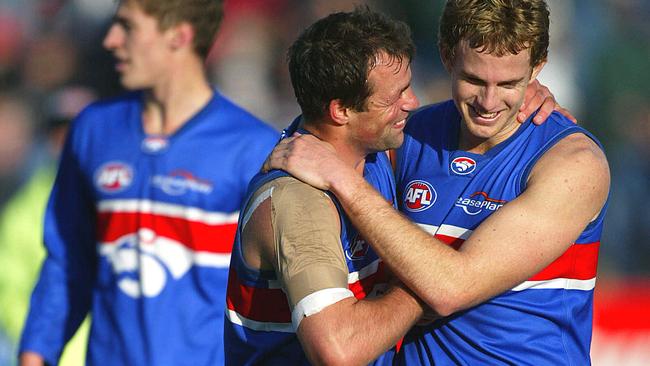 Brad Johnson and Patrick Bowden celebrate their 2003 win at Skilled Stadium.