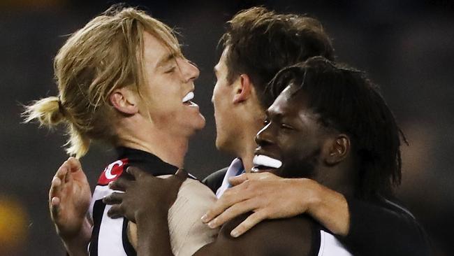 MELBOURNE, AUSTRALIA - JULY 03: Martin Frederick of the Power celebrates a goal with Miles Bergman of the Power during the 2021 AFL Round 16 match between the Hawthorn Hawks and the Port Adelaide Power at Marvel Stadium on July 3, 2021 in Melbourne, Australia. (Photo by Dylan Burns/AFL Photos via Getty Images)