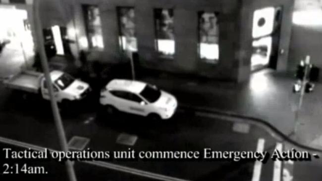 CCTV footage showing Tactical Operations unit outside the Lindt Cafe at 2:14am.