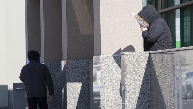 Fahed and Tracy Elniz leaving the Hobart Magistrates Court at an earlier hearing.