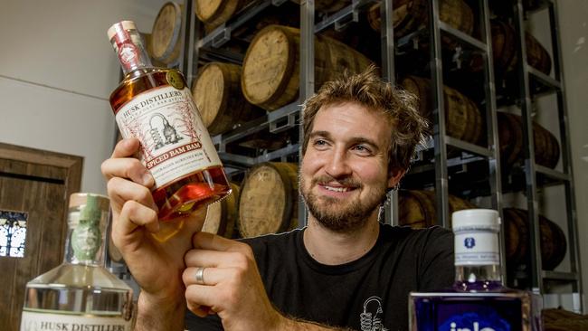 Husk Distillers head distiller Steven Payne with their premier rum. Picture: Jerad Williams