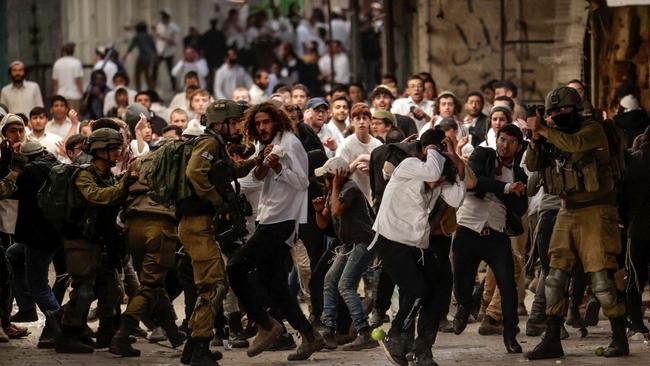 Israeli security forces amid altercations between Jewish settlers on their way to visit the tomb of Othniel ben Kenaz in the area H1 (controlled by Palestinian authorities) and Palestinian residents, in the occupied West Bank city of Hebron, on November 19, 2022. Picture: HAZEM BADER / AFP