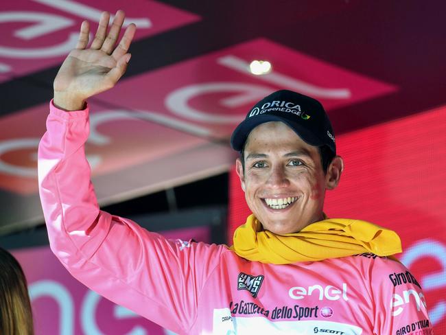 Colombian and Orica-GreenEDGE rider Esteban Chaves celebrates on the podium.