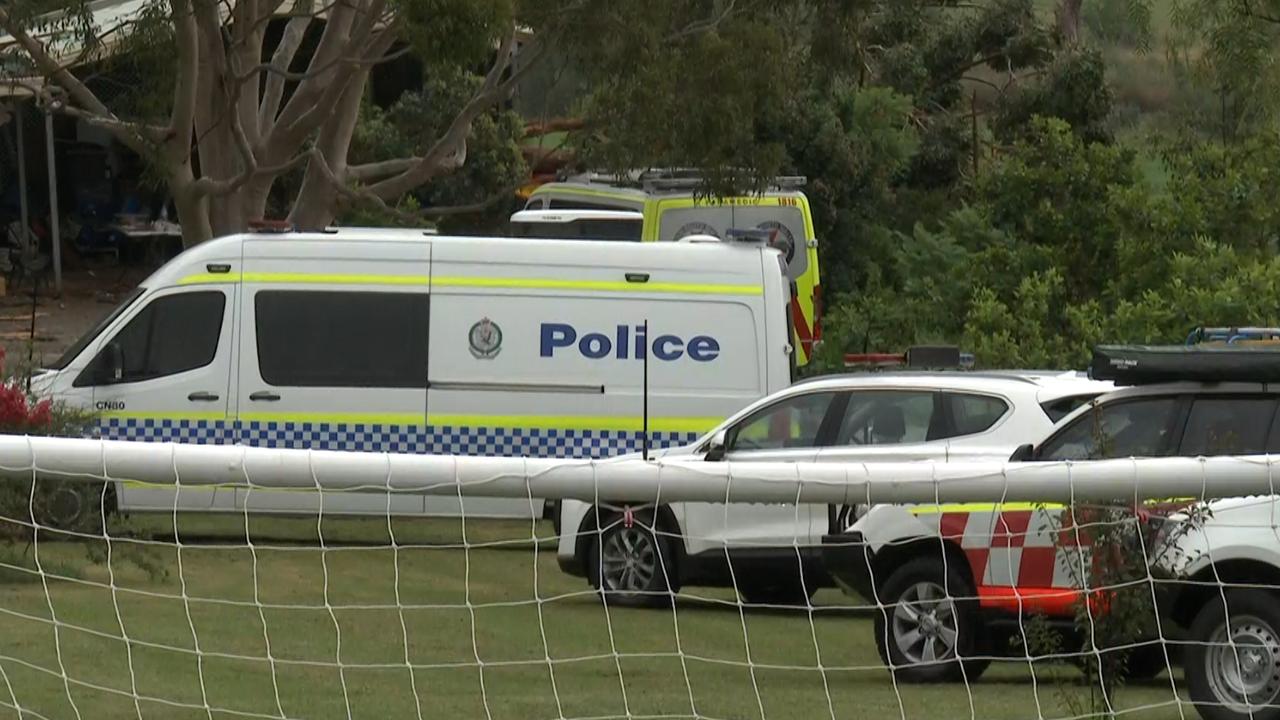 A woman has died and another is injured after a tree “exploded” after a lightning strike during a freak storm. Picture: TNV