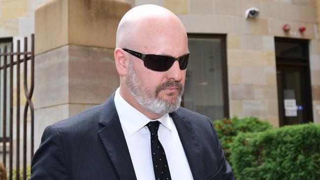 Police officer Andrew Jaunay leaves the Adelaide Magistrates Court in 2017. After years of legal wrangling he is now standing trial, charged with assaulting a teenager in Whyalla in 2013. Picture: AAP Image/David Mariuz