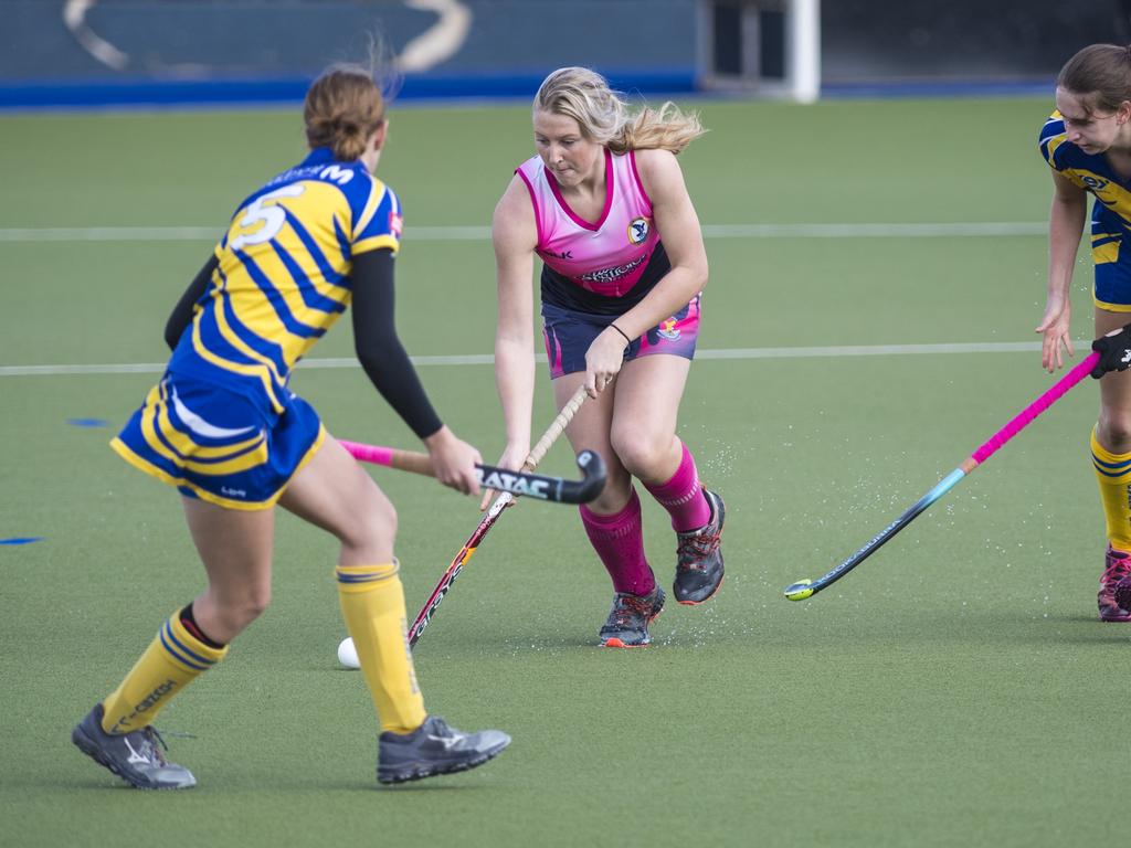 Jessica Wallace (centre) of Toowoomba 2 against Townsville in Hockey Queensland Championships at Clyde Park, Saturday, May 1, 2021. Picture: Kevin Farmer