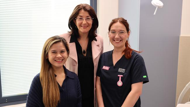 Nurse Augie Marie Don, Health Minister Jacquie Petrusma, and nurse Belle Merrigan.