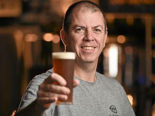 CHEERS: 4 Hearts Brewing head brewer Ken Friend with a glass of the newest batch of Wabbit Saison Carrot Beer. Picture: Cordell Richardson