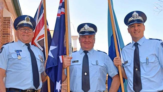 HONOUR: Sergeant Matt Carmody, Sergeant Sean Donaghy and Acting Sergeant David Holmes-Brown commemorate their colleagues. Picture: Meg Gannon