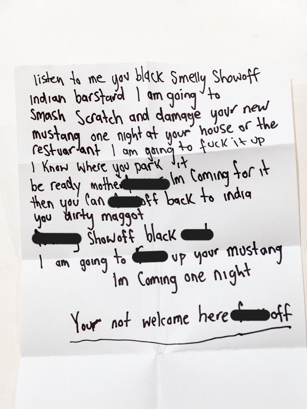 A photo of a racist letter Mr Singh was mailed. Photographed by Linda Higginson.