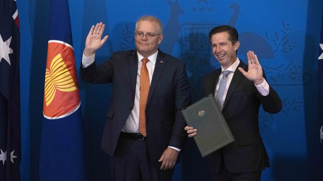 Prime Minister Scott Morrison with Trade Minister Simon Birmingham at the signing of the Regional Comprehensive Economic Partnership trade deal. Picture: NCA NewsWire /Gary Ramage