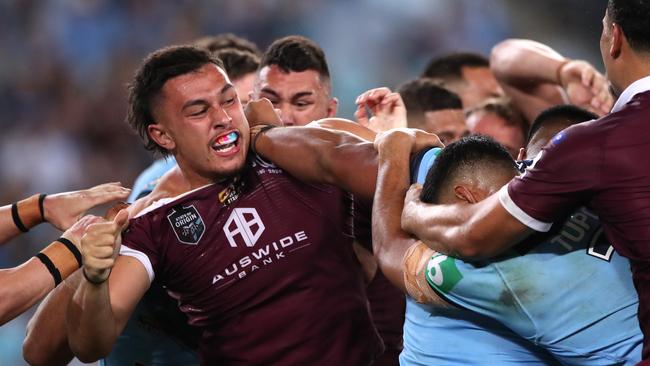 Tino Fa'asuamaleaui of the Maroons and Payne Haas of the Blues scuffle. (Photo by Mark Kolbe/Getty Images)