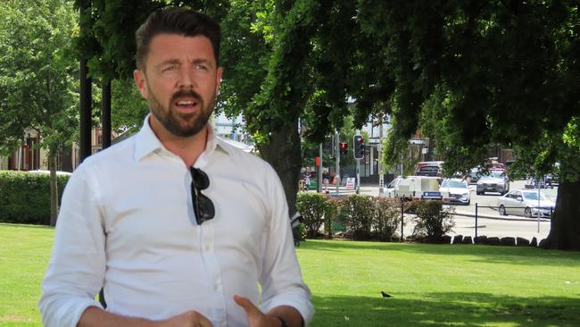 Liberal Senator Jonno Duniam speaks to the media on Parliament Lawns in Hobart on Friday, December 6, 2024.