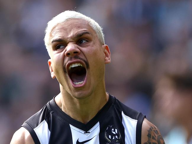 MELBOURNE, AUSTRALIA - APRIL 20: Bobby Hill of the Magpies celebrates kicking a goal  during the round six AFL match between Collingwood Magpies and Port Adelaide Power at Melbourne Cricket Ground, on April 20, 2024, in Melbourne, Australia. (Photo by Quinn Rooney/Getty Images) *** BESTPIX ***