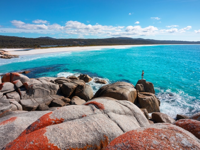 <span>35/50</span><h2>Bay of Fires, TAS</h2><p>One of Tassie’s best coastal regions, the Bay of Fires is a crowd pleaser for visitors to the island-state. With orange-lichen covered boulders, underwater caves and soft sandy beaches, it is a popular spot for divers, snorkelers, <a href="https://www.escape.com.au/destinations/australia/tasmania/worth-travelling-for-beachfront-camping-at-tasmanias-bay-of-fires/news-story/c6b78439392ff9bcdbf1529bc8943d6b" target="_blank" rel="noopener">hikers</a>, <a href="https://www.escape.com.au/destinations/australia/tasmania/worth-travelling-for-beachfront-camping-at-tasmanias-bay-of-fires/news-story/c6b78439392ff9bcdbf1529bc8943d6b">campers</a> and day trippers from Launceston.  Picture: Tourism Australia</p>