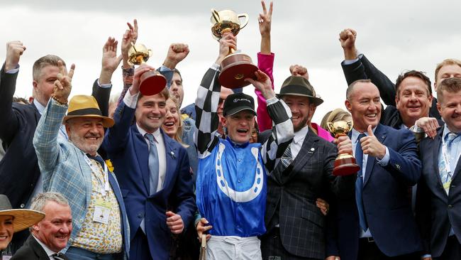 Mark Zahra with trainers Ciaron Maher and David Eustace after the presentation. Picture: Michael Klein.