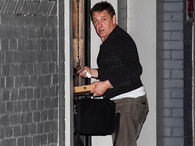 Mark Thompson arriving at his home in Port Melbourne. Picture: Lawrence Pinder