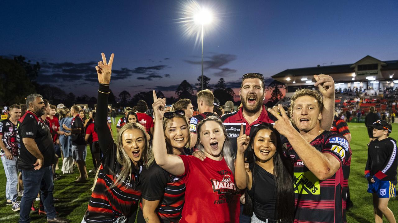 Valleys supporters (from left) Molly Choice, Bree Lawton, Maddie Mailman, Jessie Mailman and Kristine Joy with Valleys reserve grade captain Jaren Bender celebrate their TRL grand final win in reserve grade at Toowoomba Sports Ground, Saturday, September 14, 2024. Picture: Kevin Farmer