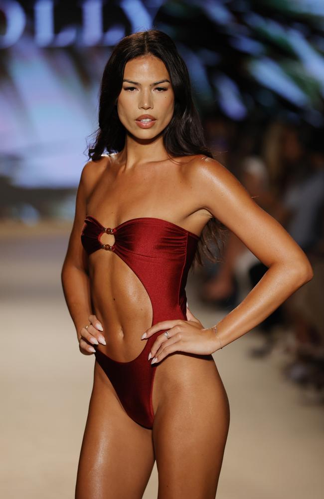 Minford wore a striking red one-piece with a cut-out that flashed her abs. Picture: Frazer Harrison/Getty Images for Oh Polly