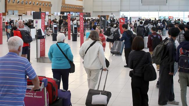 Adelaide airport is already getting busy on the first day of the Easter holidays. Picture: Dean Martin