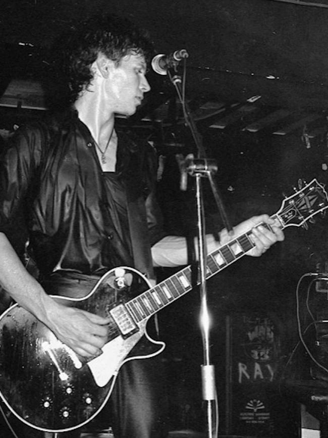 Davies performing with his band Flowers in the late 1970s.