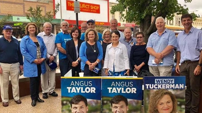 Now you see it .... Angus Taylor (far right), Wendy Tuckerman and Pru Goward (centre) pose in front of The Reject Shop. Picture: Facebook