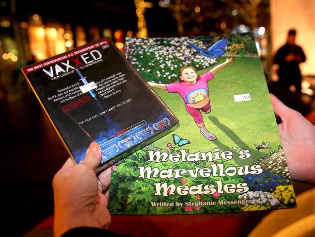 A DVD of the movie and a book teaching how children can attract measles. Picture: Mark Stewart