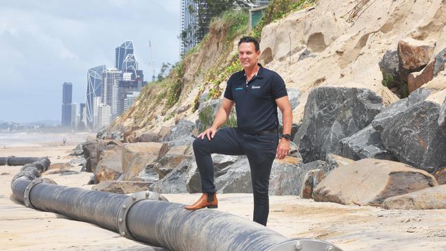 Councillor Darren Taylor inspects the damage caused by huge seas from Cyclone Alfred at Narrowneck. Picture Glenn Hampson