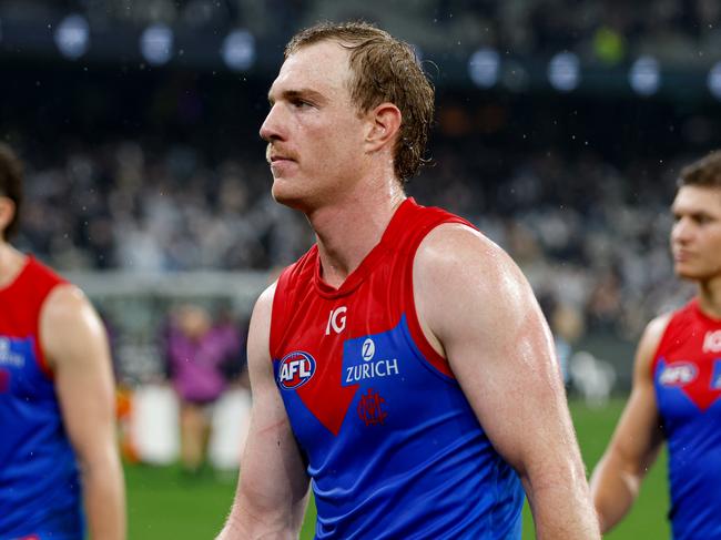 MELBOURNE, AUSTRALIA - MAY 09: Harrison Petty of the Demons looks dejected after a loss during the 2024 AFL Round 09 match between the Carlton Blues and the Melbourne Demons at The Melbourne Cricket Ground on May 09, 2024 in Melbourne, Australia. (Photo by Dylan Burns/AFL Photos via Getty Images)