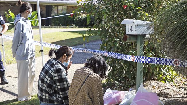 Family and friends visit the murder scene. Picture: NCA NewsWire/Tertius Pickard