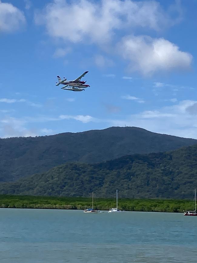 The aircraft did a few loops around Cairns, wowing spectators positioned at the marina. Picture: Angus McIntyre